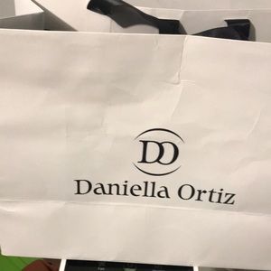“Rachel” bag by Daniella Ortiz Retails at $295 selling for $200